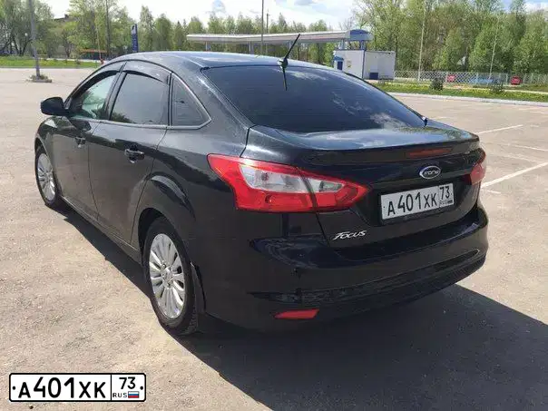 Фото автомобиля FORD FOCUS, 2011 — госномер К236НХ702. Цвет: ЧЕРНЫЙ