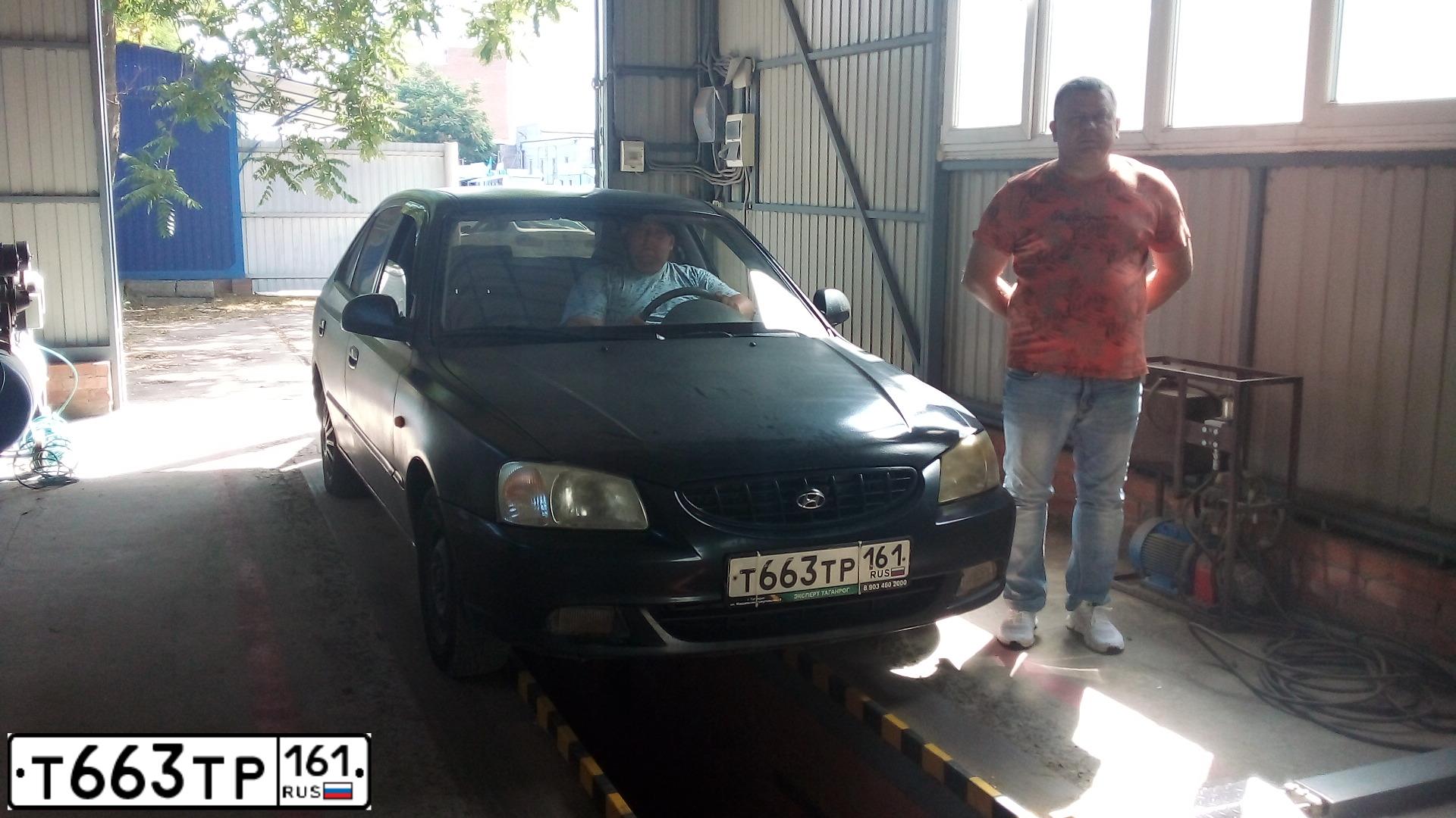 Фото автомобиля TAGAZ ACCENT, 2005 — госномер Х223ЕС180. Цвет: ЧЕРНЫЙ