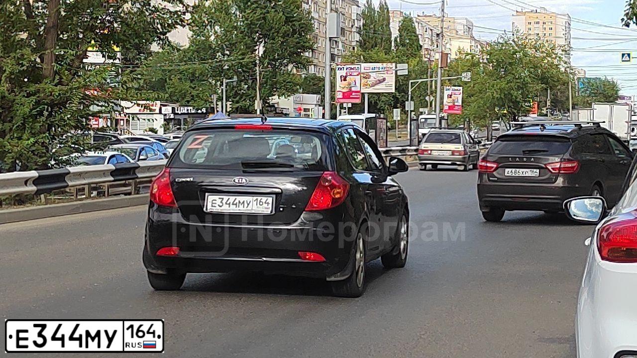 Фото автомобиля KIA CEE'D, 2008 — госномер Е344МУ164. Цвет: ЧЕРНЫЙ