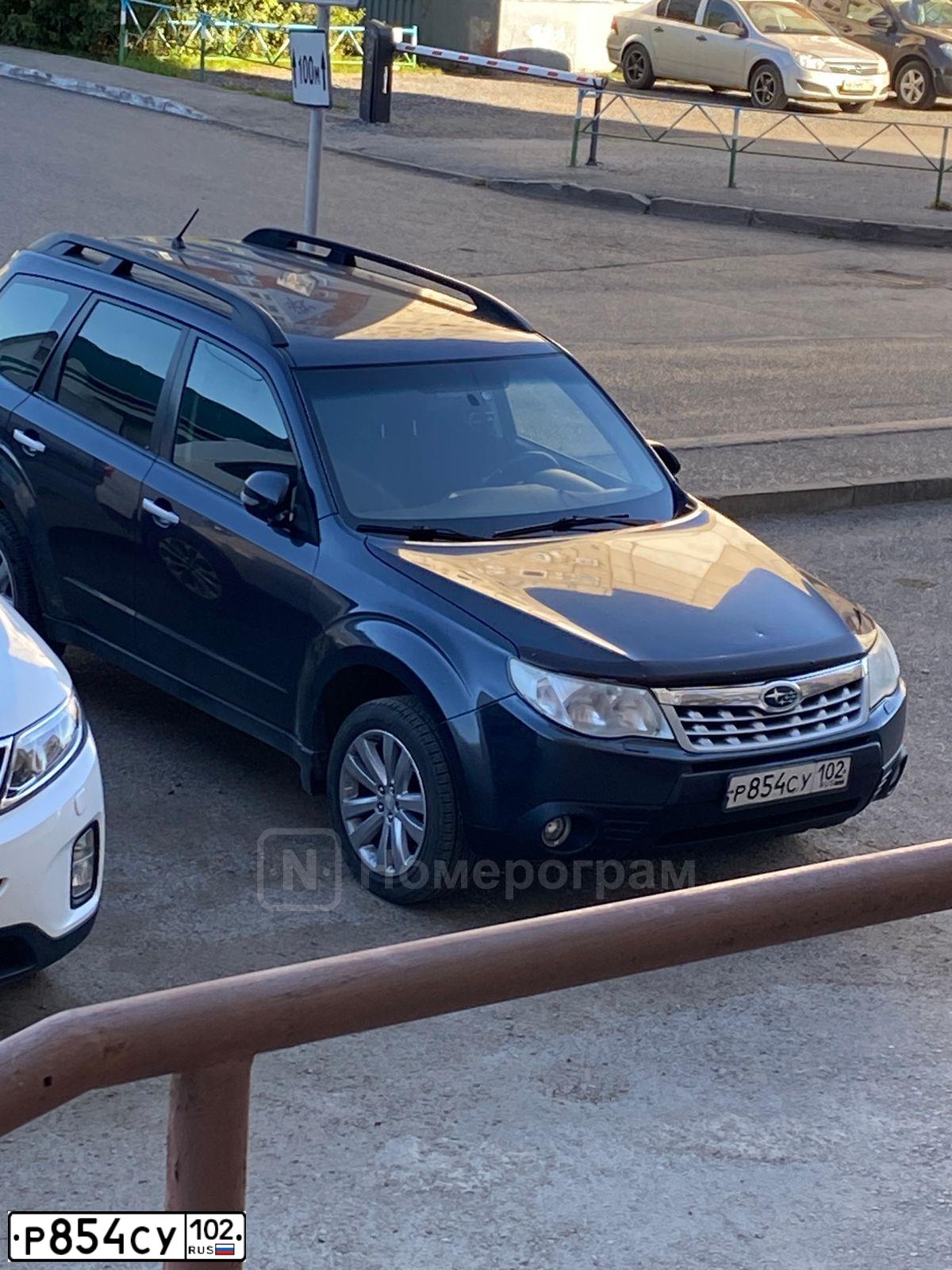 Фото автомобиля SUBARU FORESTER, 2011 — госномер К002ТК102. Цвет: СЕРЫЙ