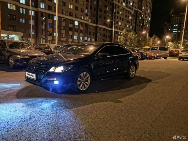 Фото автомобиля VOLKSWAGEN PASSAT, 2009 — госномер Т348ОТ777. Цвет: ЧЕРНЫЙ