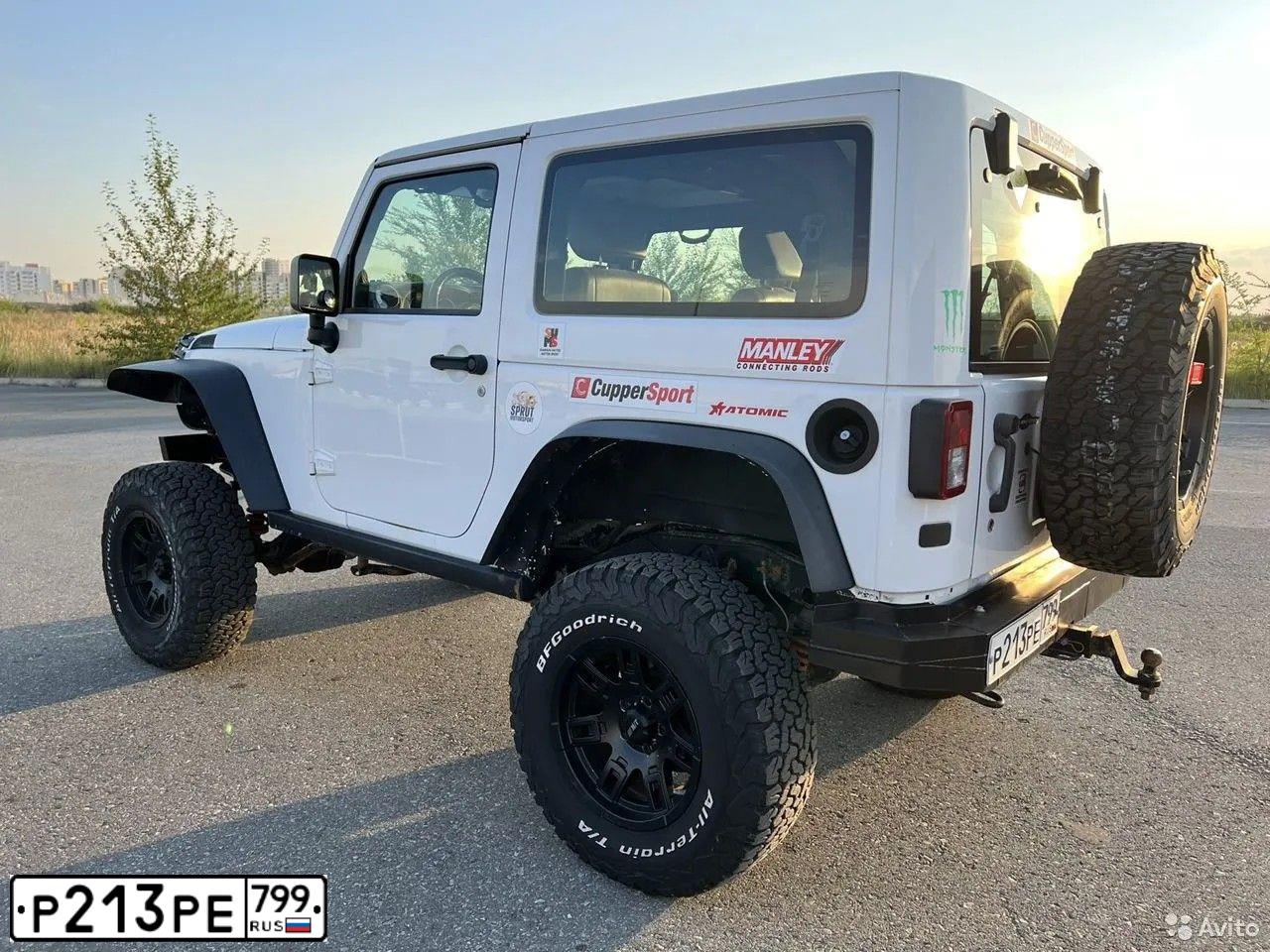 Фото автомобиля JEEP WRANGLER, 2011 — госномер Х001АВ73. Цвет: БЕЛЫЙ