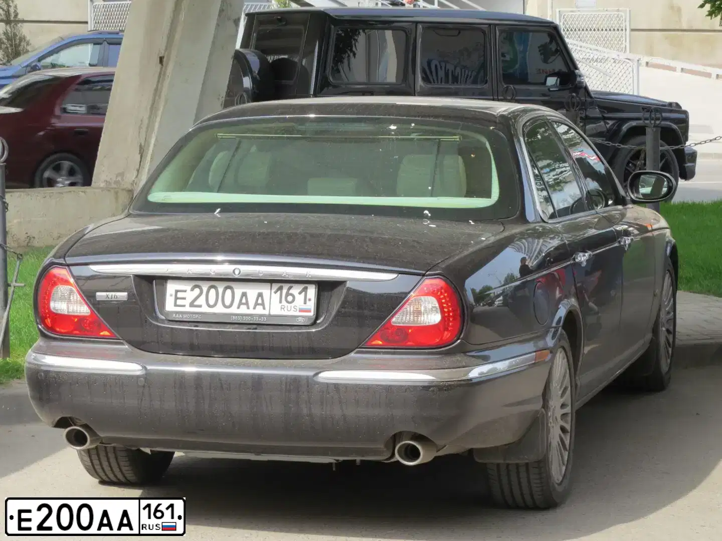 Фото автомобиля JAGUAR XJ-SERIE, 2007 — госномер Н390АЕ761. Цвет: ЧЕРНЫЙ