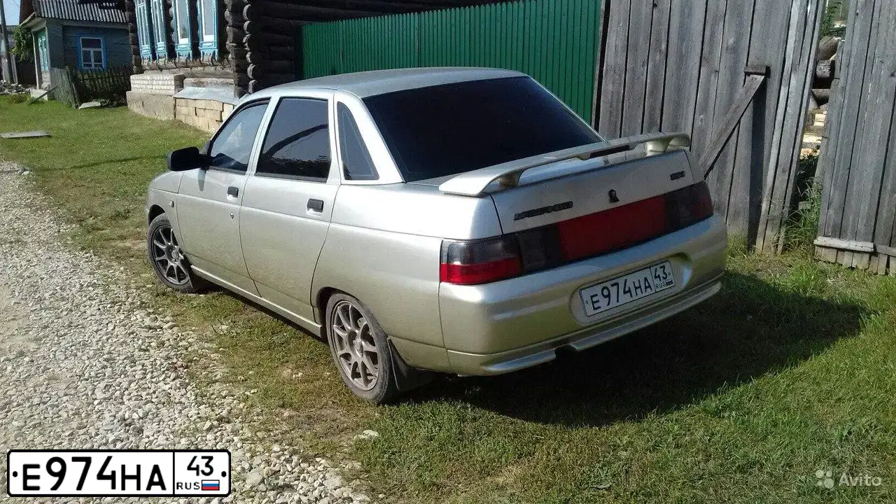 Фото автомобиля LADA 2110, 2006 — госномер Е974НА43. Цвет: СЕРЕБРИСТО-БЕЖЕВЫЙ
