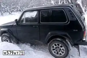 Фото автомобиля LADA 2121 NIVA, 1995 — госномер К579АТ142. Цвет: ЧЕРНЫЙ
