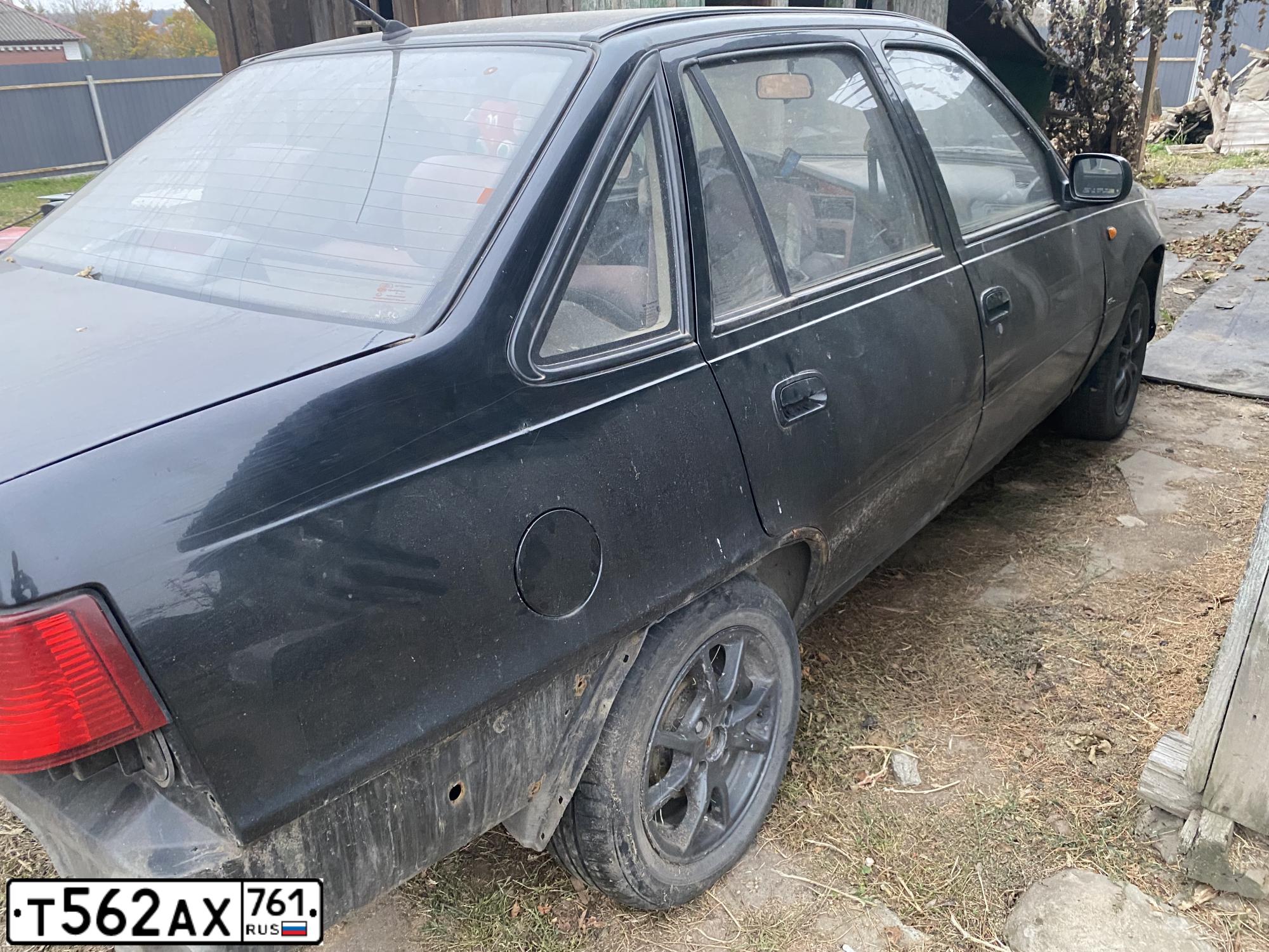 Фото автомобиля DAEWOO NEXIA, 2009 — госномер Р640ВР180. Цвет: КОРАЛЛОВО-ЧЕРНЫЙ