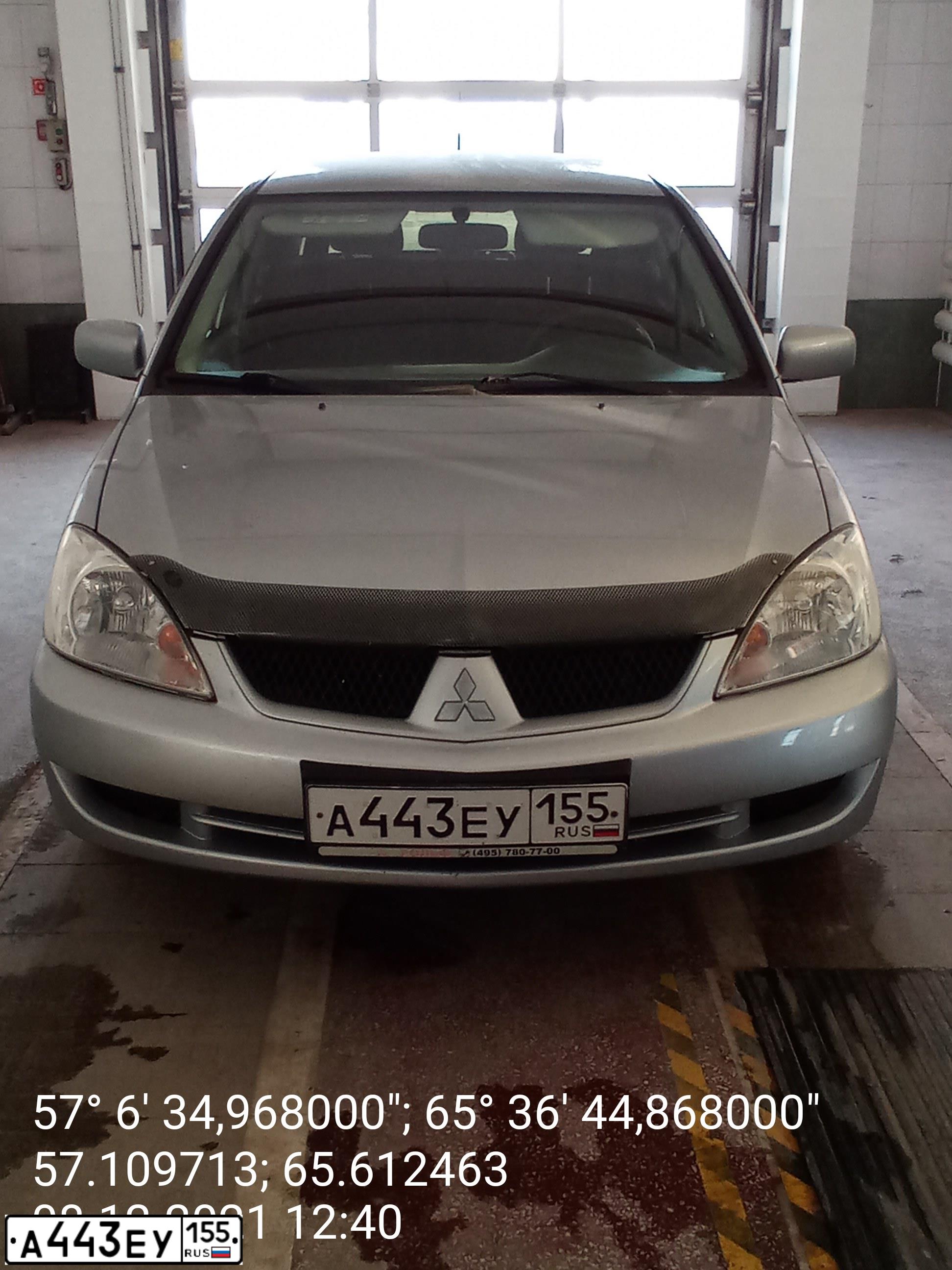 Фото автомобиля MITSUBISHI LANCER, 2009 — госномер Р460ХМ72. Цвет: Серебристый
