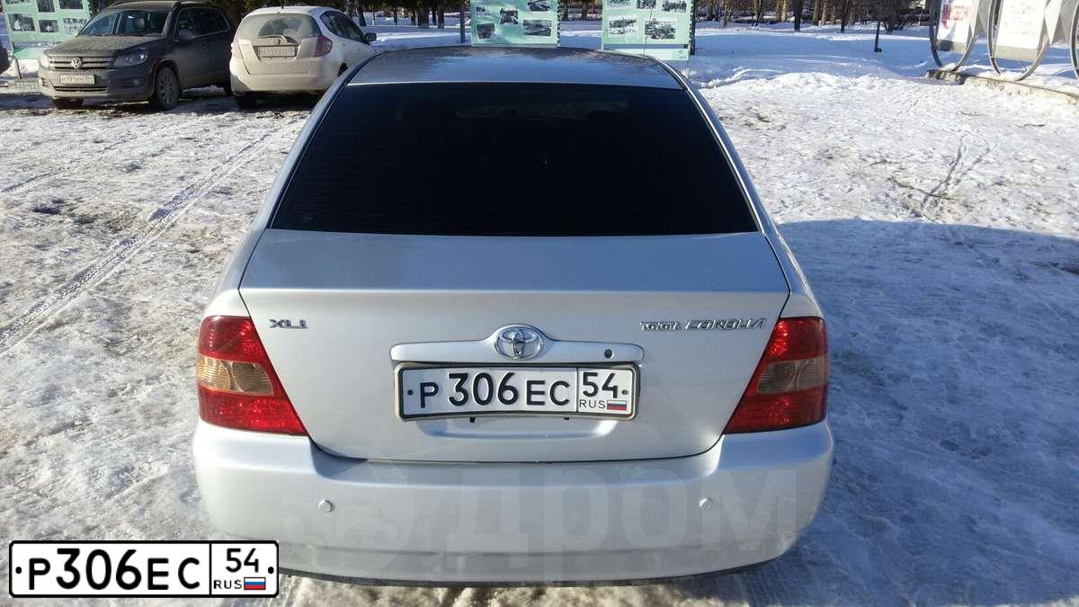 Фото автомобиля TOYOTA COROLLA, 2001 — госномер Н114ХА22. Цвет: СЕРЫЙ