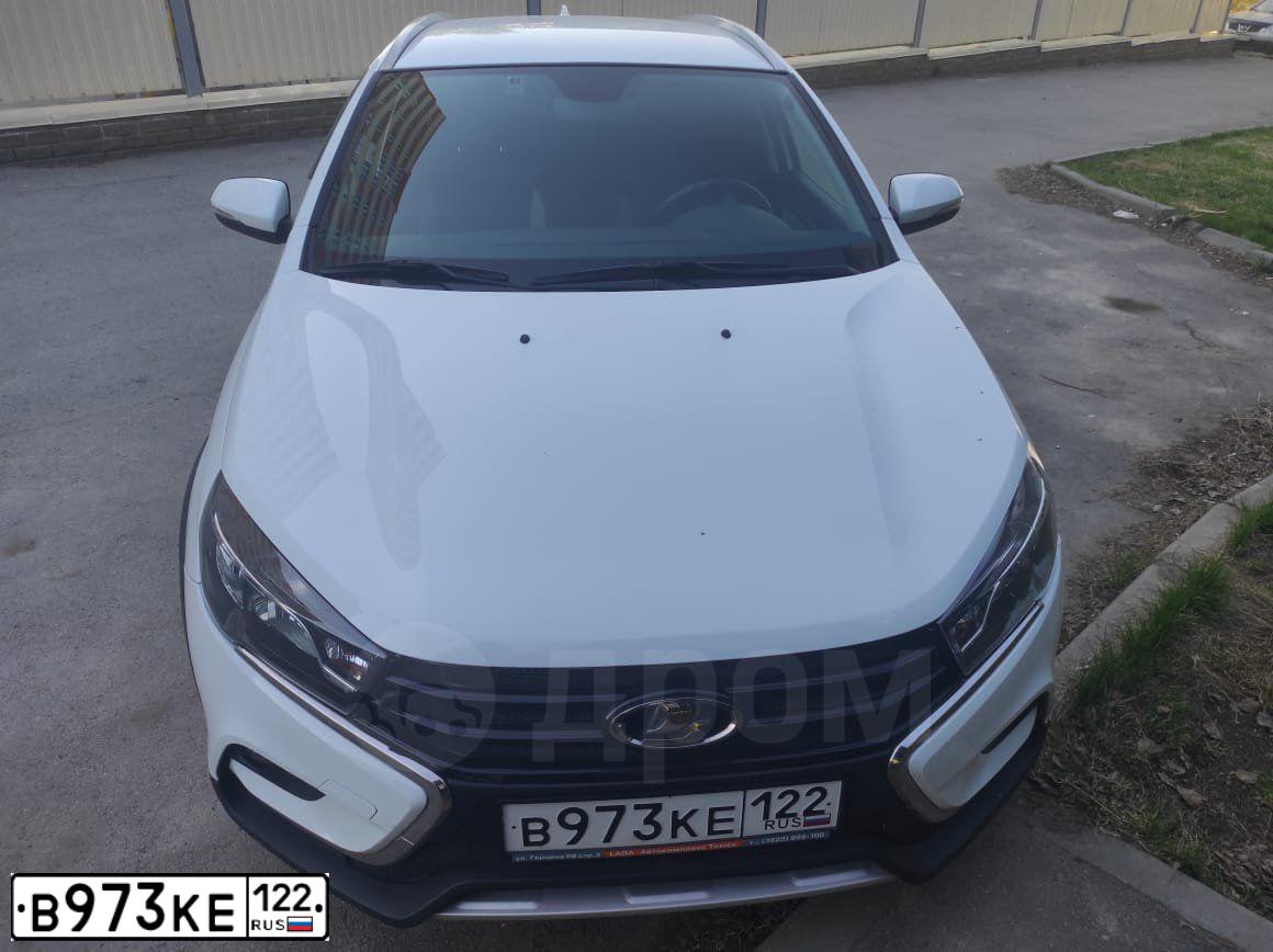 Фото автомобиля LADA VESTA, 2019 — госномер Н134НН154. Цвет: Белый