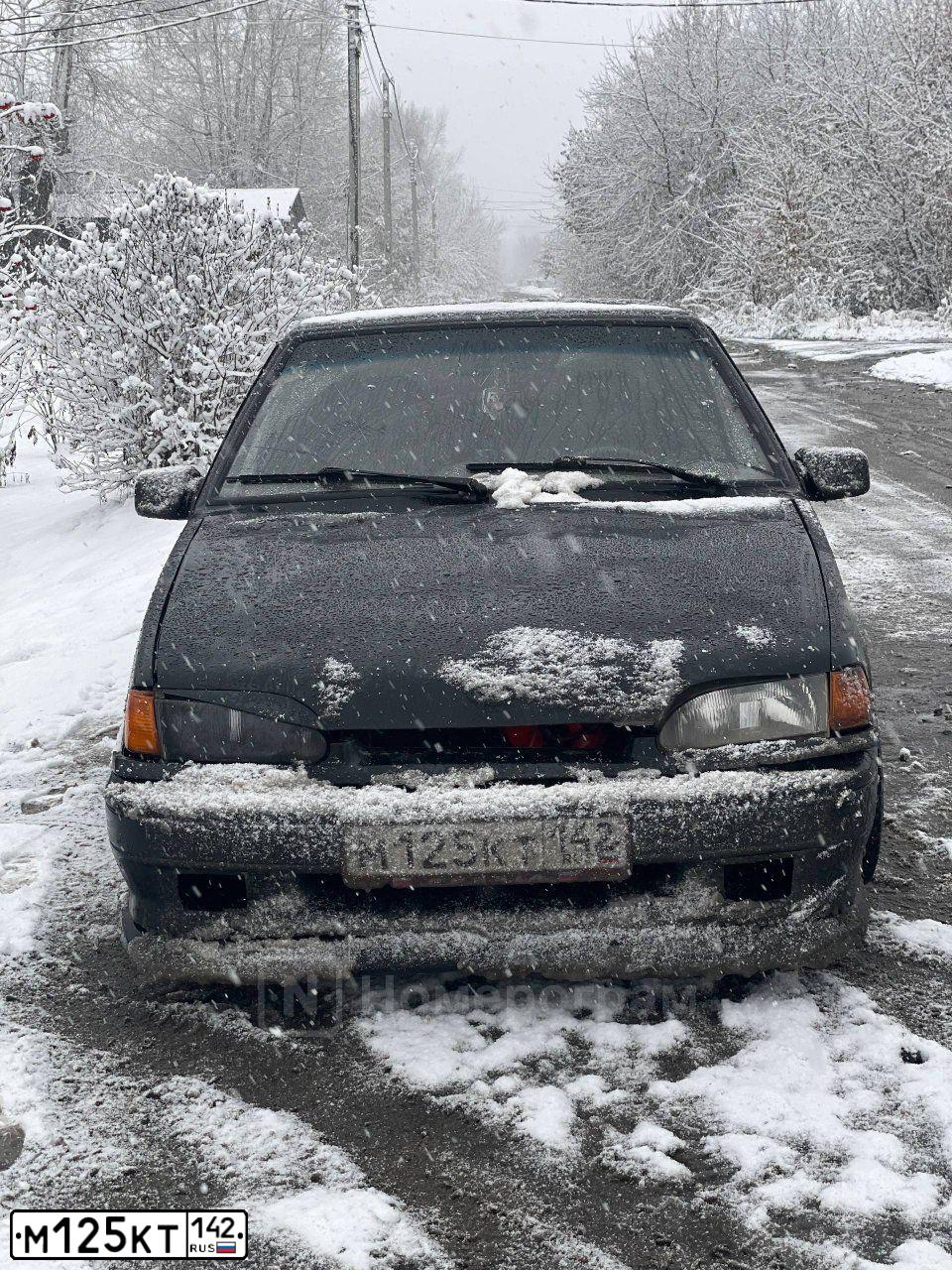 Фото автомобиля LADA 2114 SAMARA, 2003 — госномер М125КТ142. Цвет: ЧЕРНЫЙ