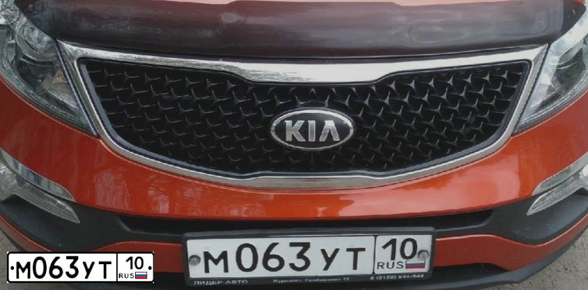 Фото автомобиля KIA SPORTAGE, 2014 — госномер М063УТ10. Цвет: Оранжевый