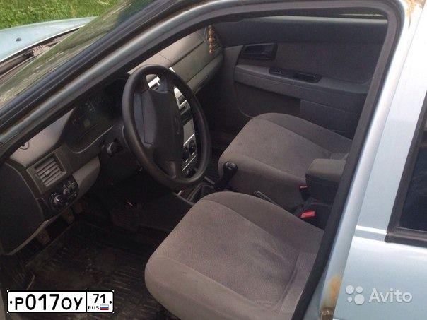 Фото автомобиля LADA 2170 PRIORA, 2008 — госномер Е071МЕ71. Цвет: Серебристо-Желто-Голубой