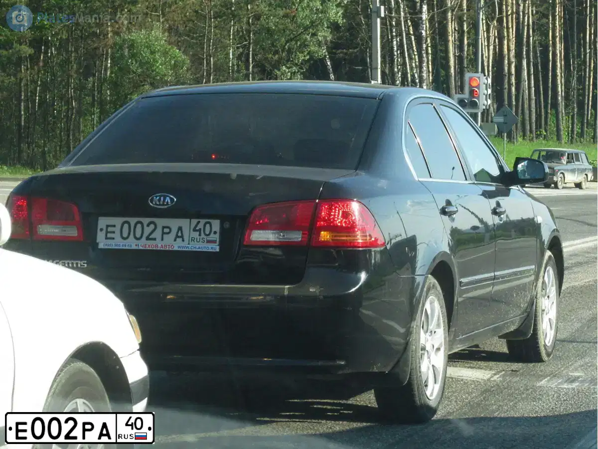 Фото автомобиля KIA MAGENTIS / OPTIMA, 2008 — госномер Е002РА40. Цвет: ЧЕРНЫЙ