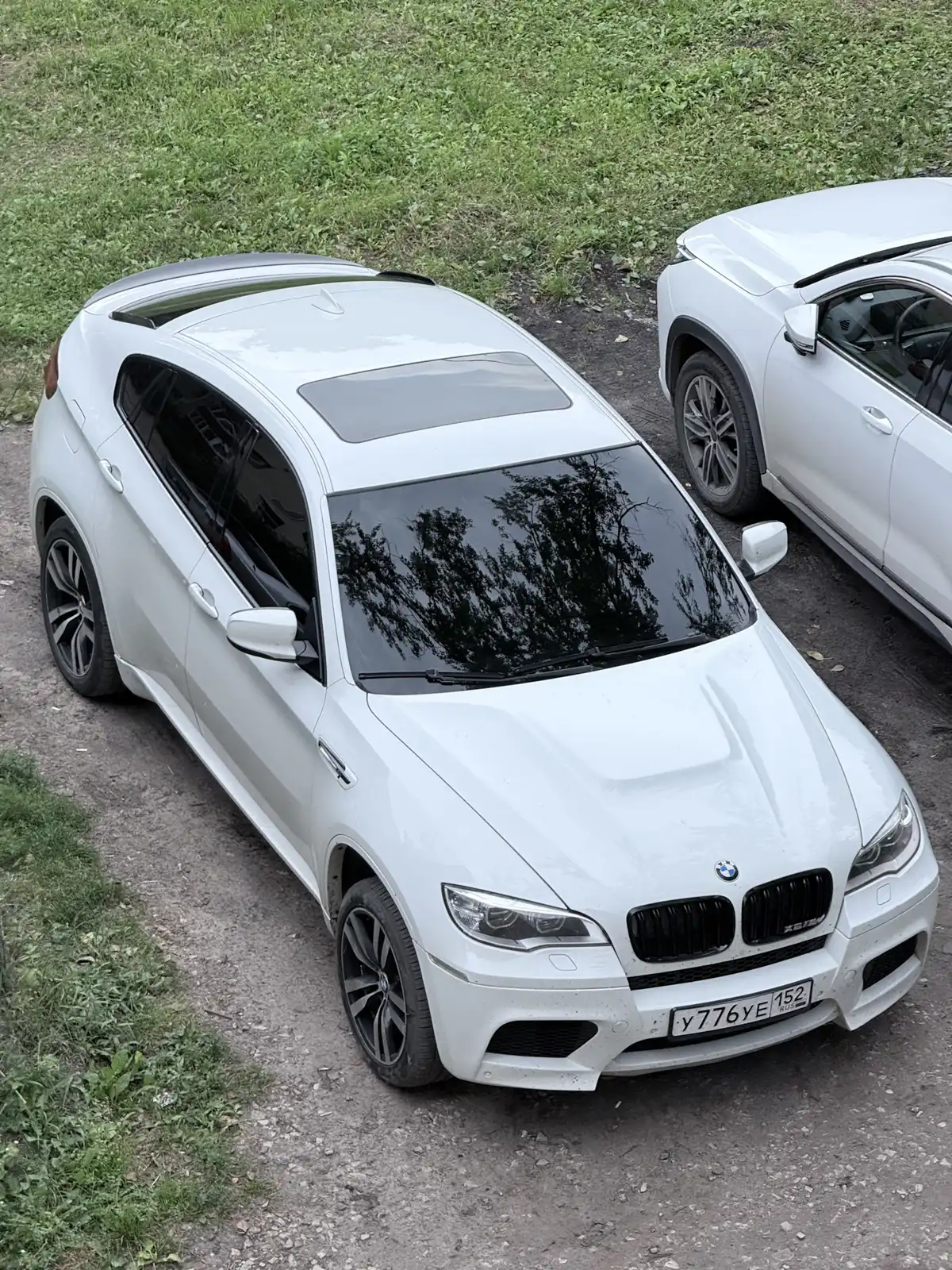 Фото автомобиля BMW X6M, 2010 — госномер У776УЕ152. Цвет: Белый