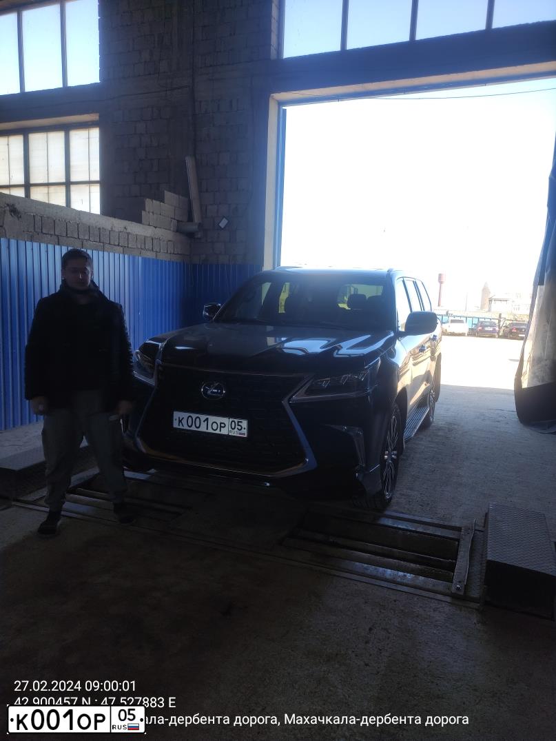 Фото автомобиля TOYOTA CAMRY, 2012 — госномер К001ОР05. Цвет: ЧЕРНЫЙ МЕТАЛЛИК