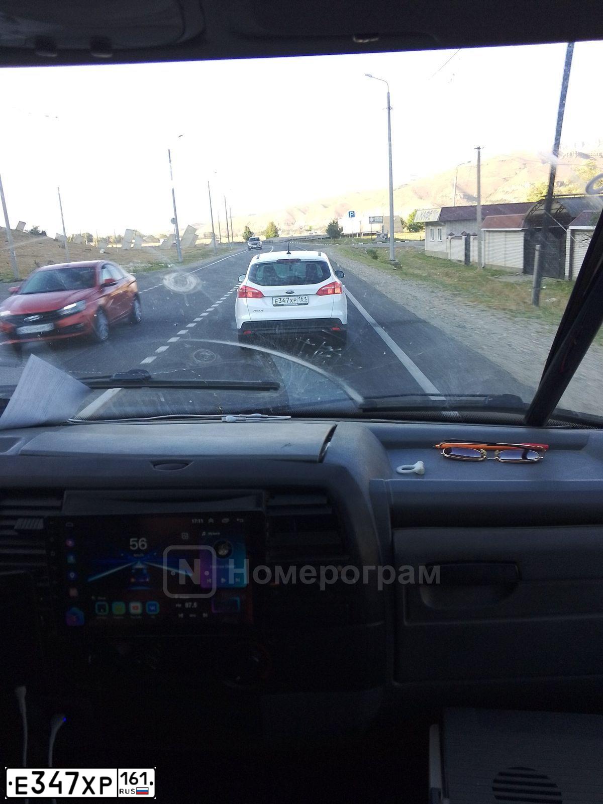 Фото автомобиля FORD FOCUS, 2017 — госномер Н059ЕР763. Цвет: Белый
