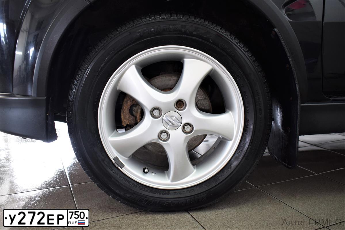 Фото автомобиля SUZUKI IGNIS, 2007 — госномер Е414ЕТ790. Цвет: ЧЕРНЫЙ