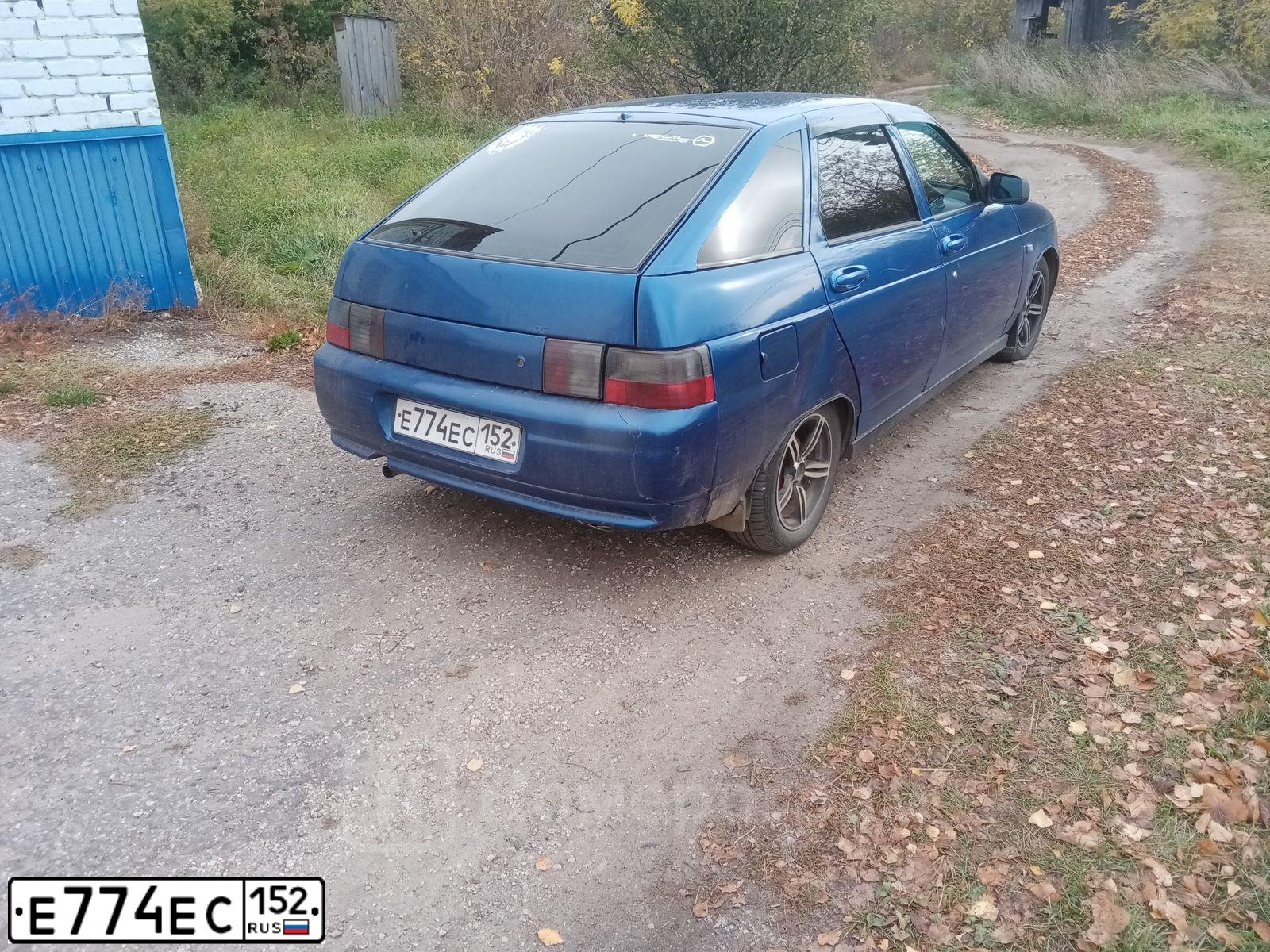 Фото автомобиля LADA 2112, 2007 — госномер Е774ЕС152. Цвет: синий