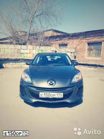 Фото автомобиля MAZDA 3, 2011 — госномер Е150ОР174. Цвет: ТЕМНО-СЕРЫЙ