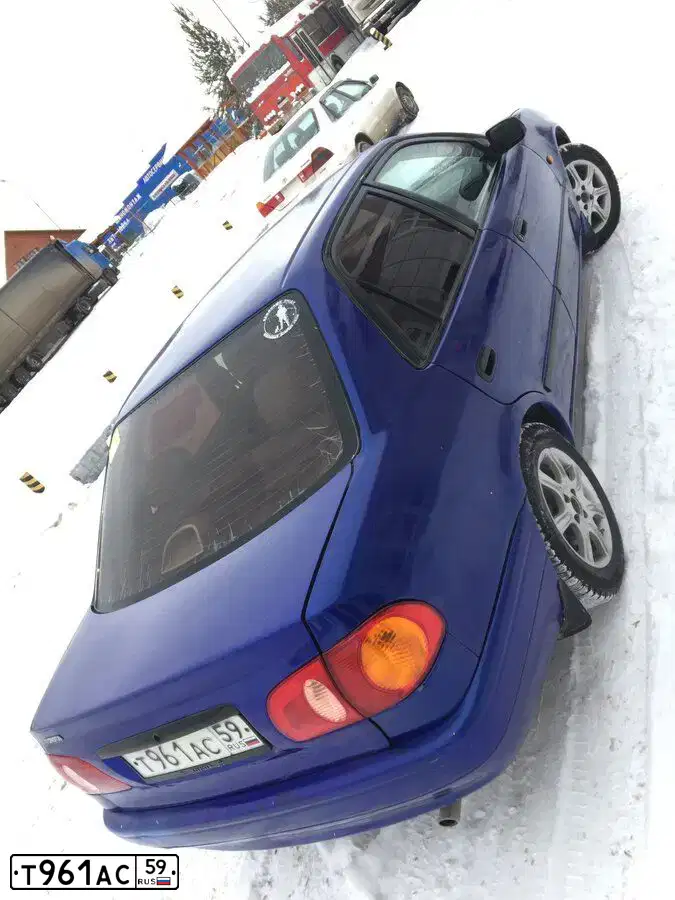 Фото автомобиля TOYOTA COROLLA, 1997 — госномер Р606ОО69. Цвет: синий
