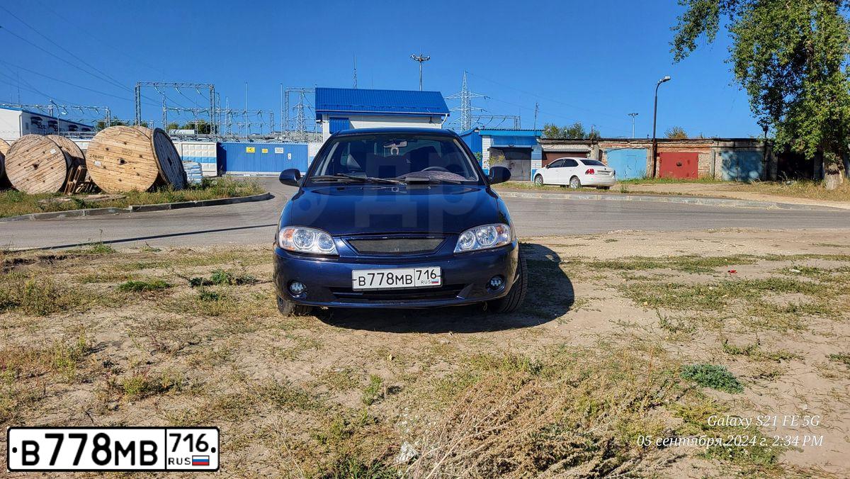 Фото автомобиля KIA SPECTRA, 2008 — госномер Х267ВР550. Цвет: Темно-синий