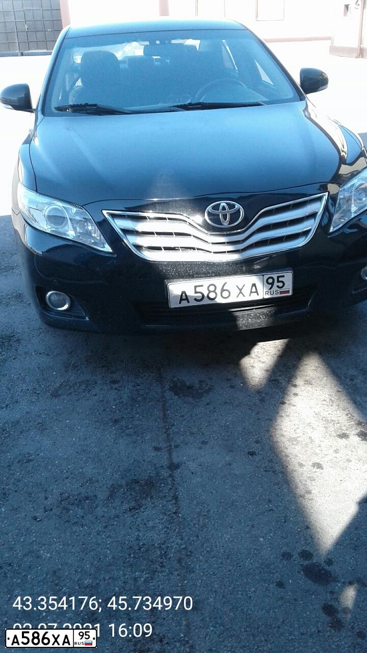 Фото автомобиля TOYOTA CAMRY, 2010 — госномер К948ОМ95. Цвет: ЧЕРНЫЙ