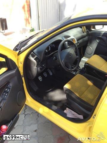 Фото автомобиля LADA 1119 KALINA, 2011 — госномер К121ВВ761. Цвет: ЖЕЛТЫЙ