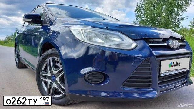 Фото автомобиля FORD FOCUS, 2012 — госномер О974ЕУ71. Цвет: СИНИЙ ТЕМНЫЙ