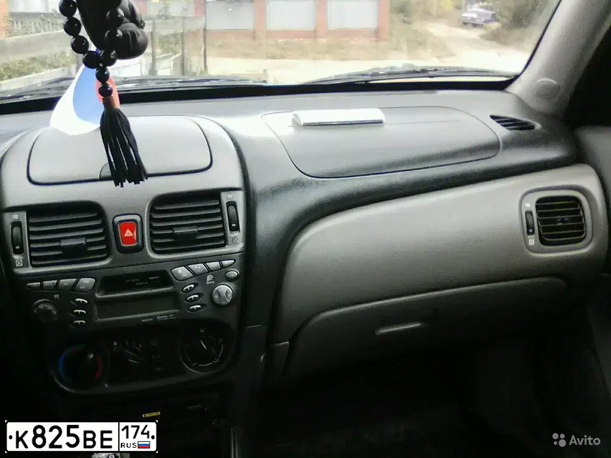 Фото автомобиля NISSAN ALMERA, 2000 — госномер Н475ВУ702. Цвет: синий