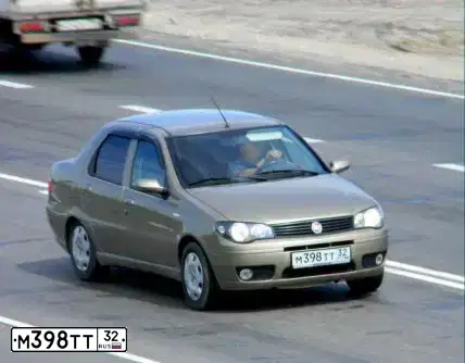Фото автомобиля FIAT ALBEA, 2012 — госномер М398ТТ32. Цвет: ПЕСОЧНЫЙ