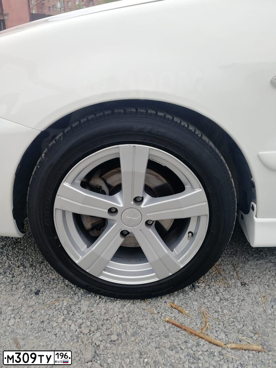 Фото автомобиля MITSUBISHI LANCER, 2007 — госномер Т927АТ96. Цвет: Белый