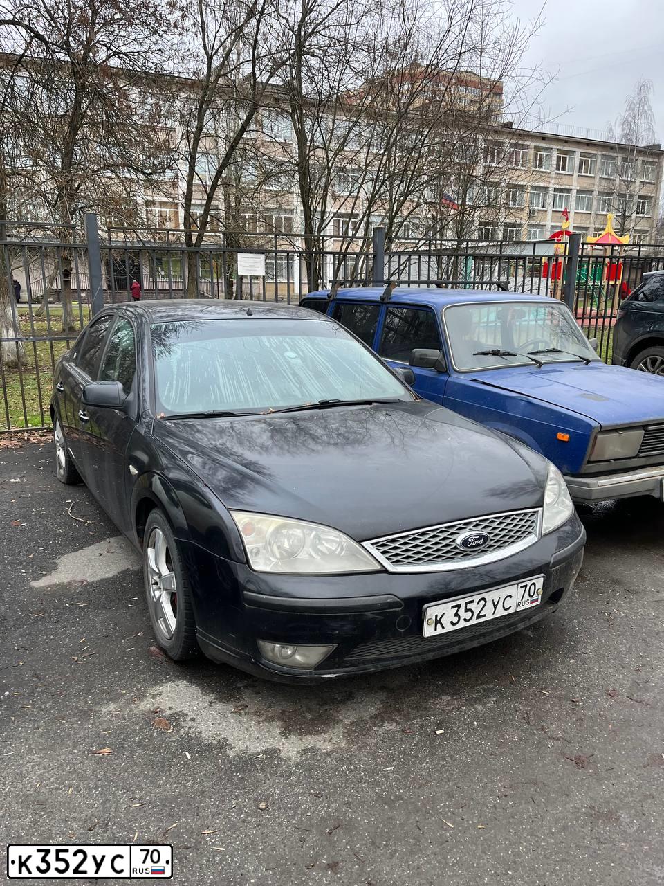 Фото автомобиля FORD MONDEO, 2006 — госномер К352УС70. Цвет: ЧЕРНЫЙ