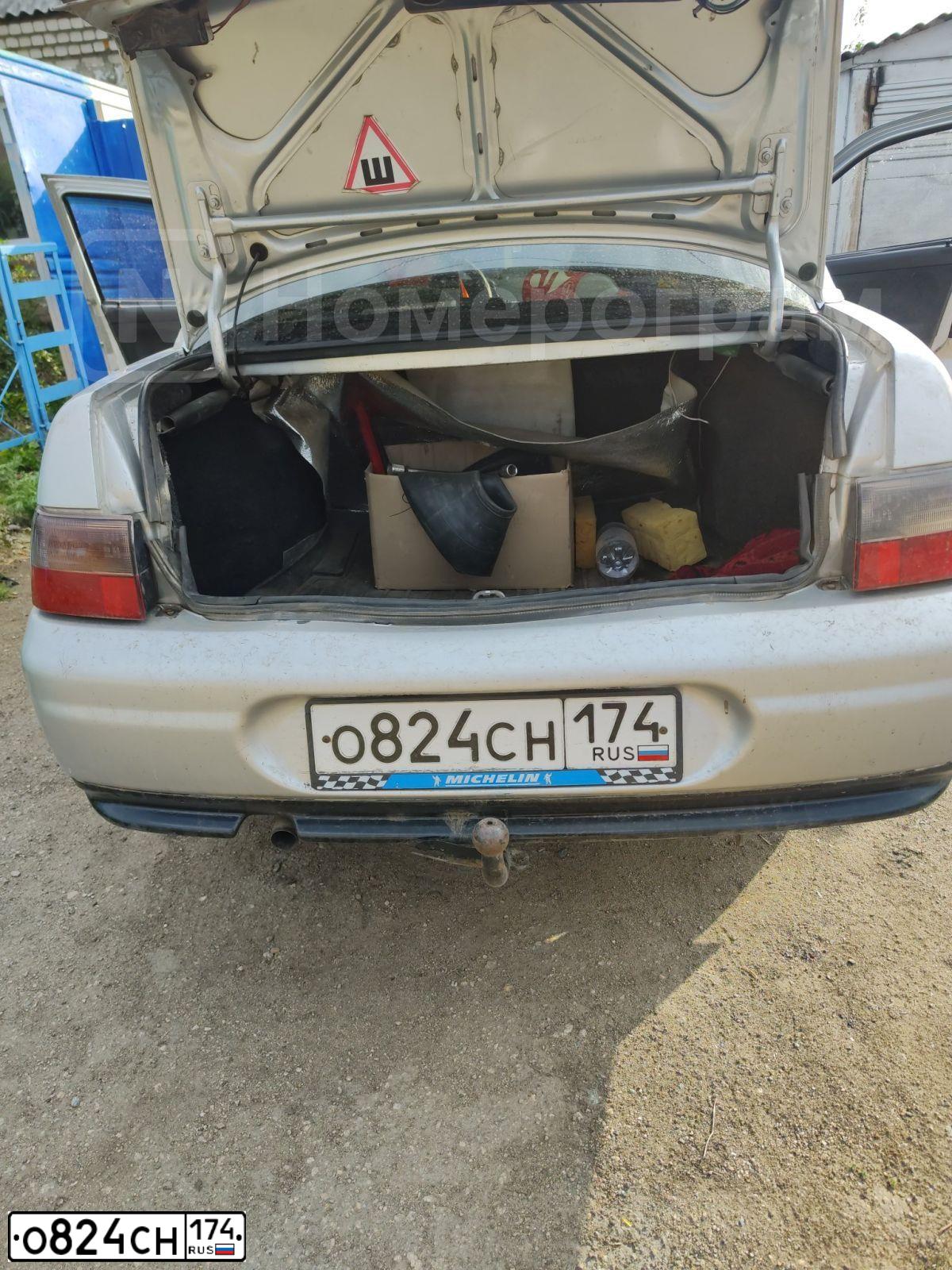 Фото автомобиля LADA 2110, 2001 — госномер О824СН174. Цвет: СВЕТЛО-СЕРЫЙ