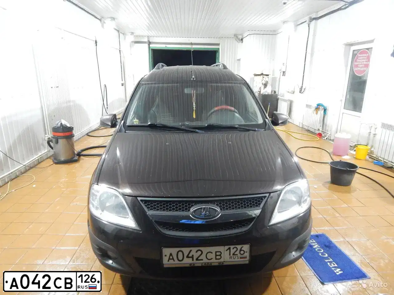 Фото автомобиля LADA LARGUS, 2015 — госномер А042СВ126. Цвет: ТЕМНО КОРИЧНЕВЫЙ