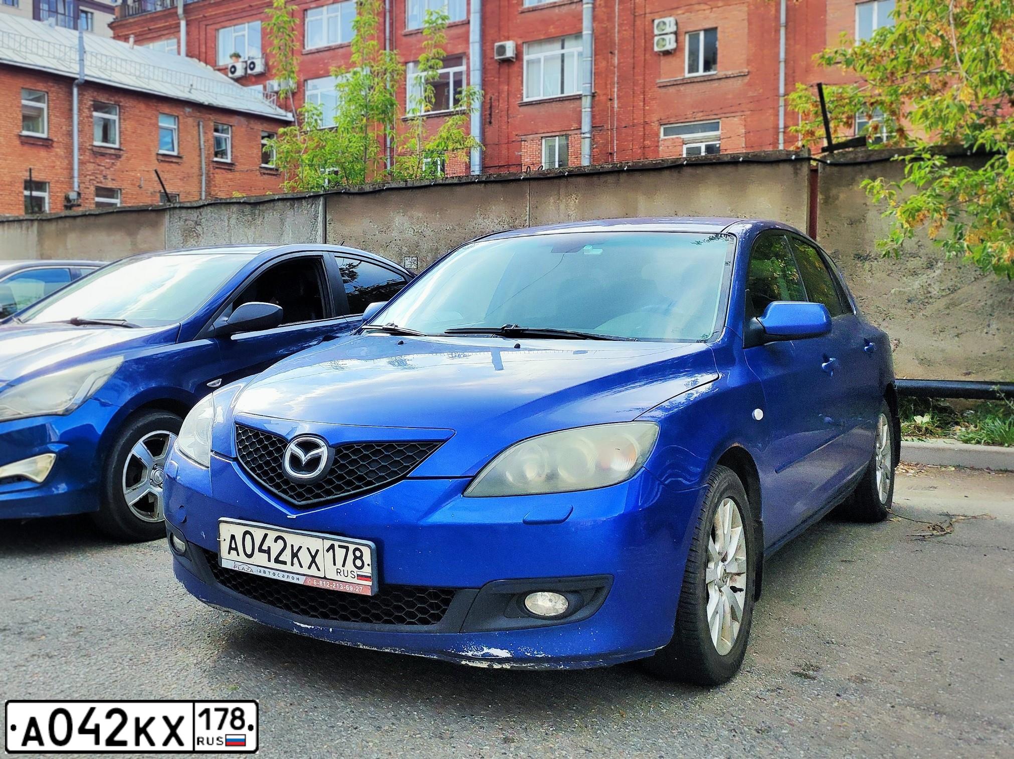 Фото автомобиля MAZDA 3, 2007 — госномер Н006ТР98. Цвет: синий