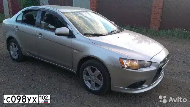 Фото автомобиля MITSUBISHI LANCER, 2011 — госномер С098УХ102. Цвет: Серебристый