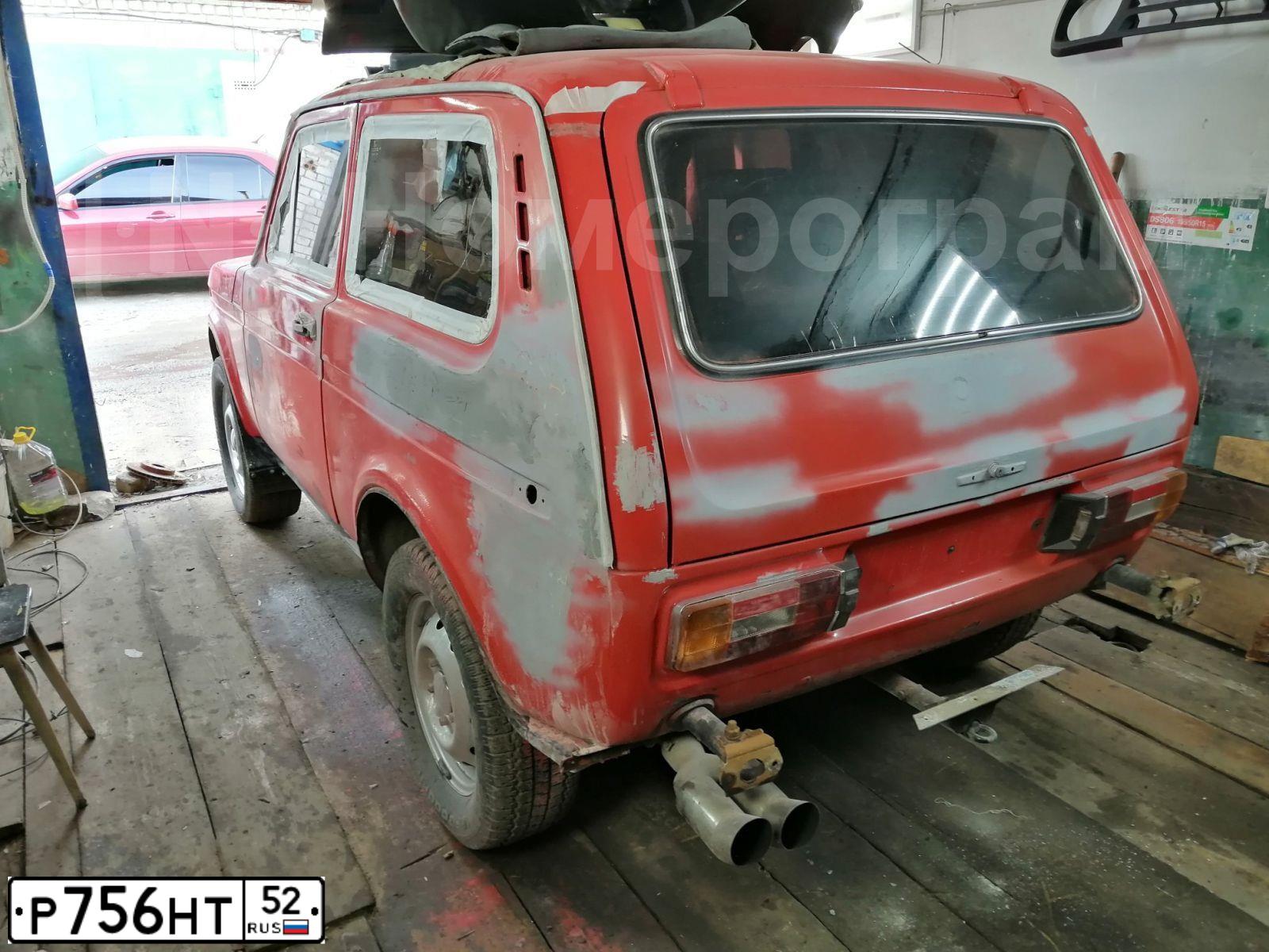 Фото автомобиля LADA 2121 NIVA, 1991 — госномер Р756НТ52. Цвет: Красный