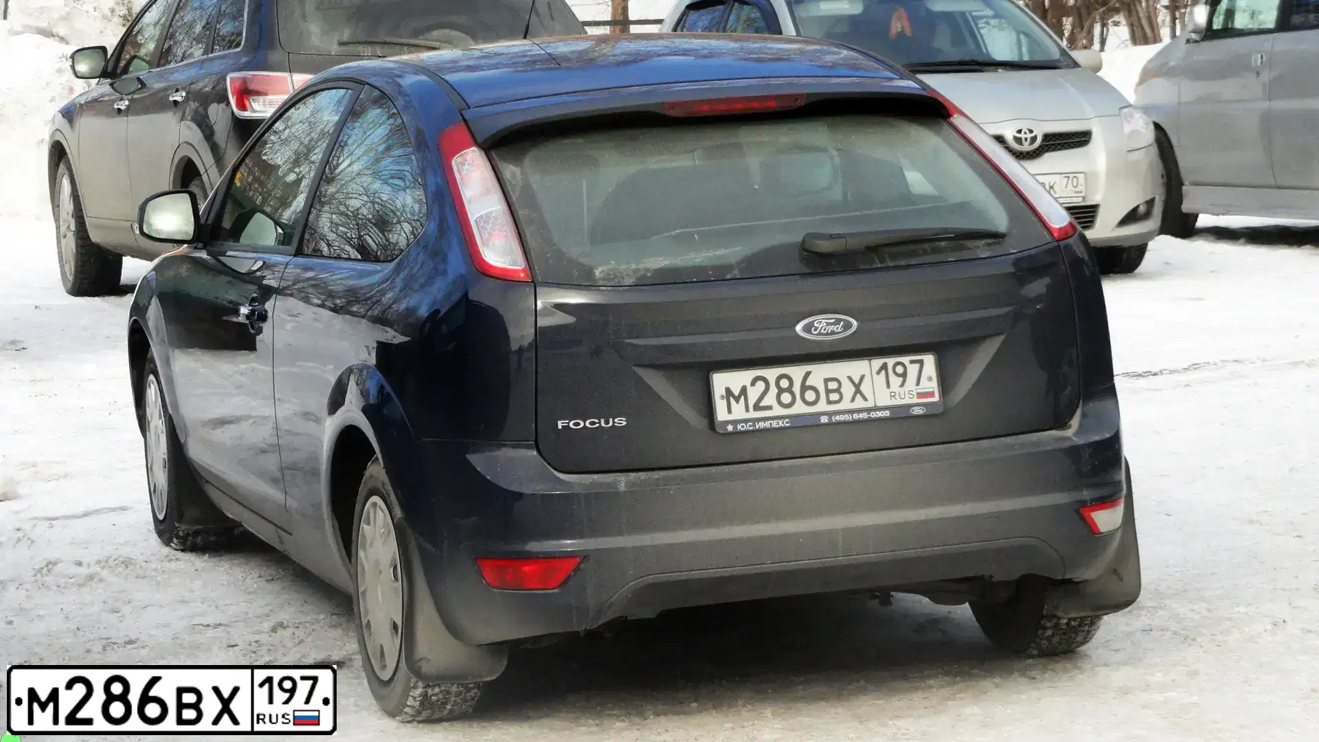 Фото автомобиля FORD FOCUS, 2010 — госномер С444РС70. Цвет: Темно-синий