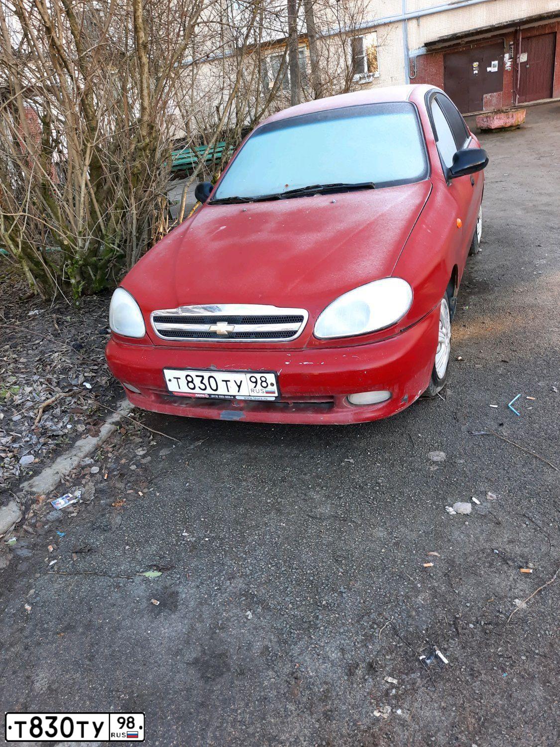 Фото автомобиля CHEVROLET LANOS, 2008 — госномер Е593РЕ147. Цвет: Красный