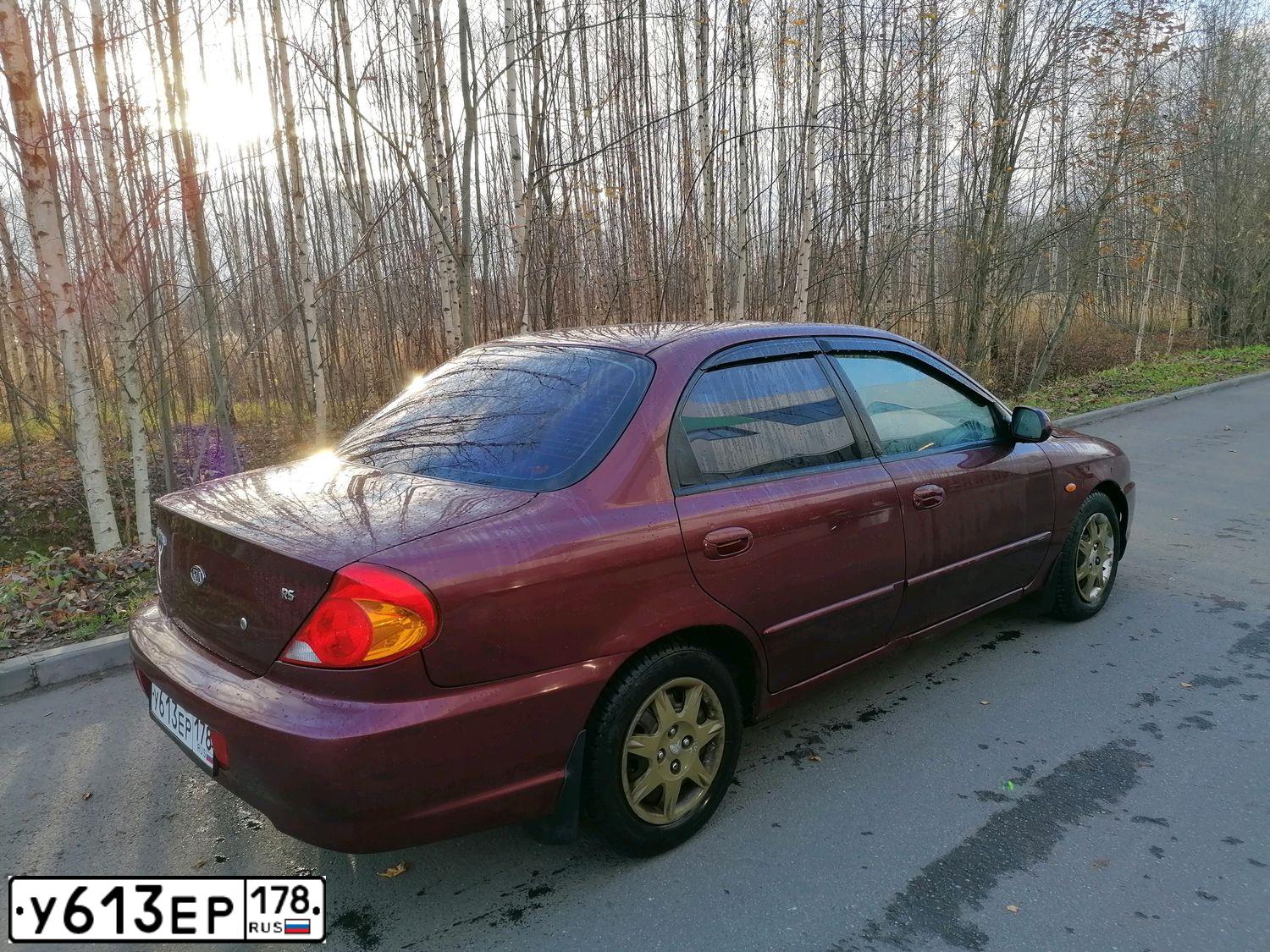 Фото автомобиля KIA SPECTRA, 2006 — госномер М997РР198. Цвет: КРАСНЫЙ ПЕРЕЦ