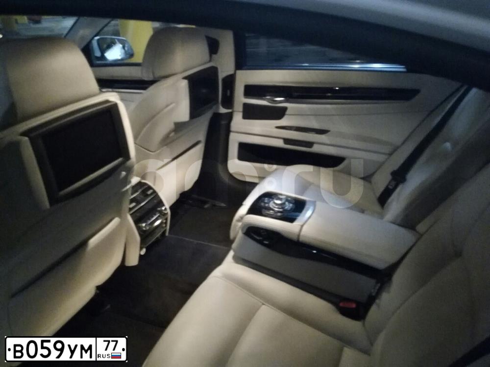 Фото автомобиля BMW SERIE 7, 2012 — госномер Р153НК152. Цвет: Белый