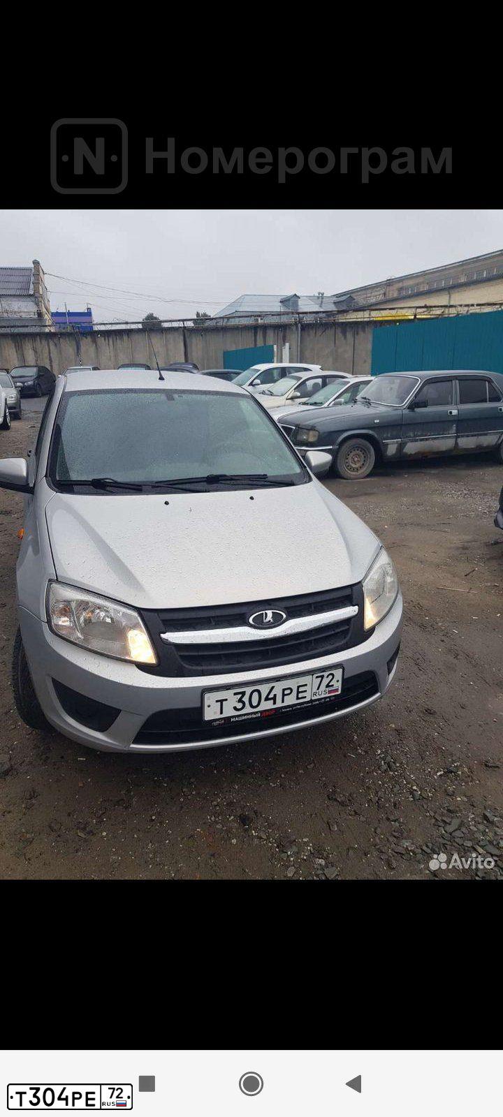 Фото автомобиля LADA 2190 GRANTA, 2016 — госномер Т304РЕ72. Цвет: Серебристый