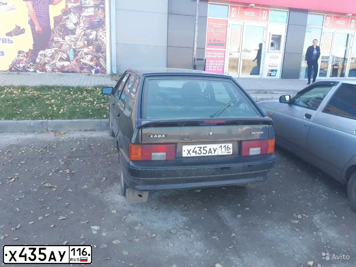 Фото автомобиля LADA 2114 SAMARA, 2008 — госномер Е493РС702. Цвет: Темно-зеленый