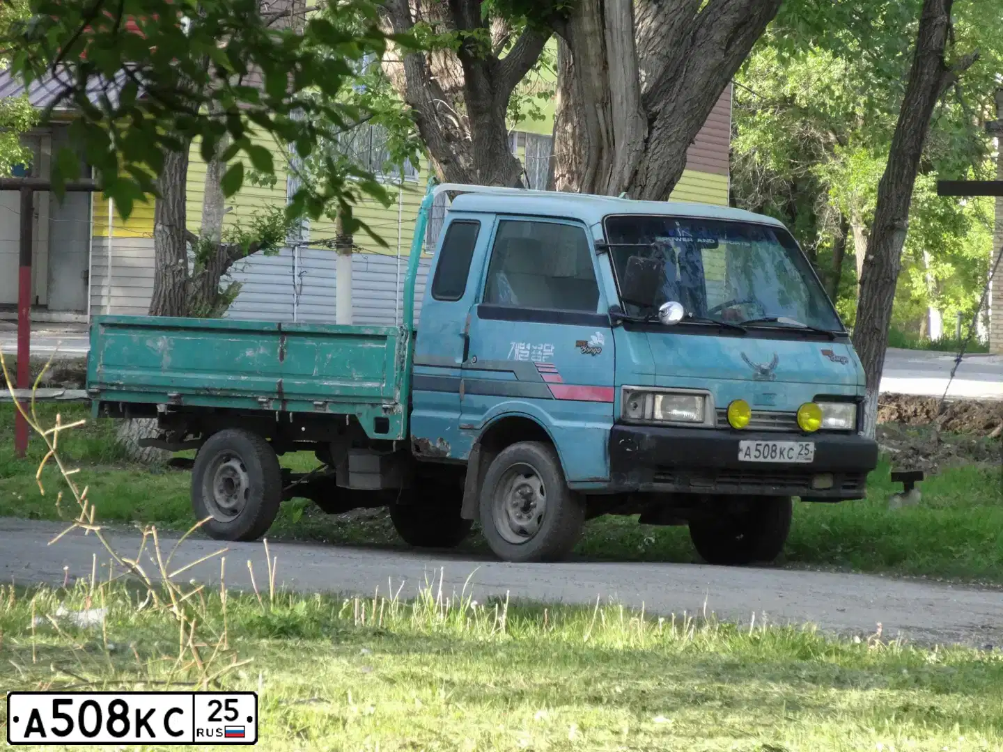 Фото автомобиля МАЗДА ВИДЕ БОНГО КИНГ КАП, 1988 — госномер А508КС25. Цвет: ЗЕЛЕНЫЙ