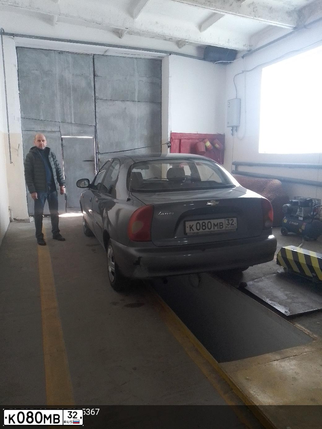Фото автомобиля CHEVROLET LANOS, 2009 — госномер О741ОТ32. Цвет: СЕРЫЙ