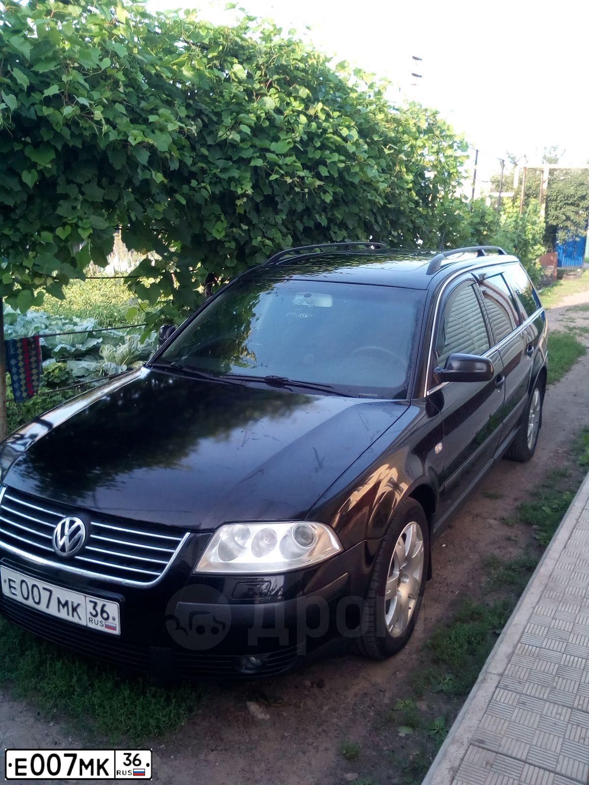 Фото автомобиля VOLKSWAGEN PASSAT, 2001 — госномер Е007МК36. Цвет: ЧЕРНЫЙ