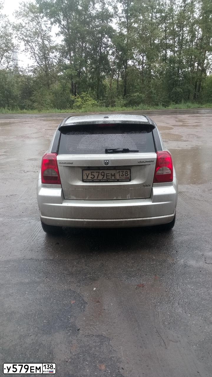Фото автомобиля DODGE CALIBER, 2010 — госномер Е720КТ77. Цвет: СЕРЕБРИСТЫЙ