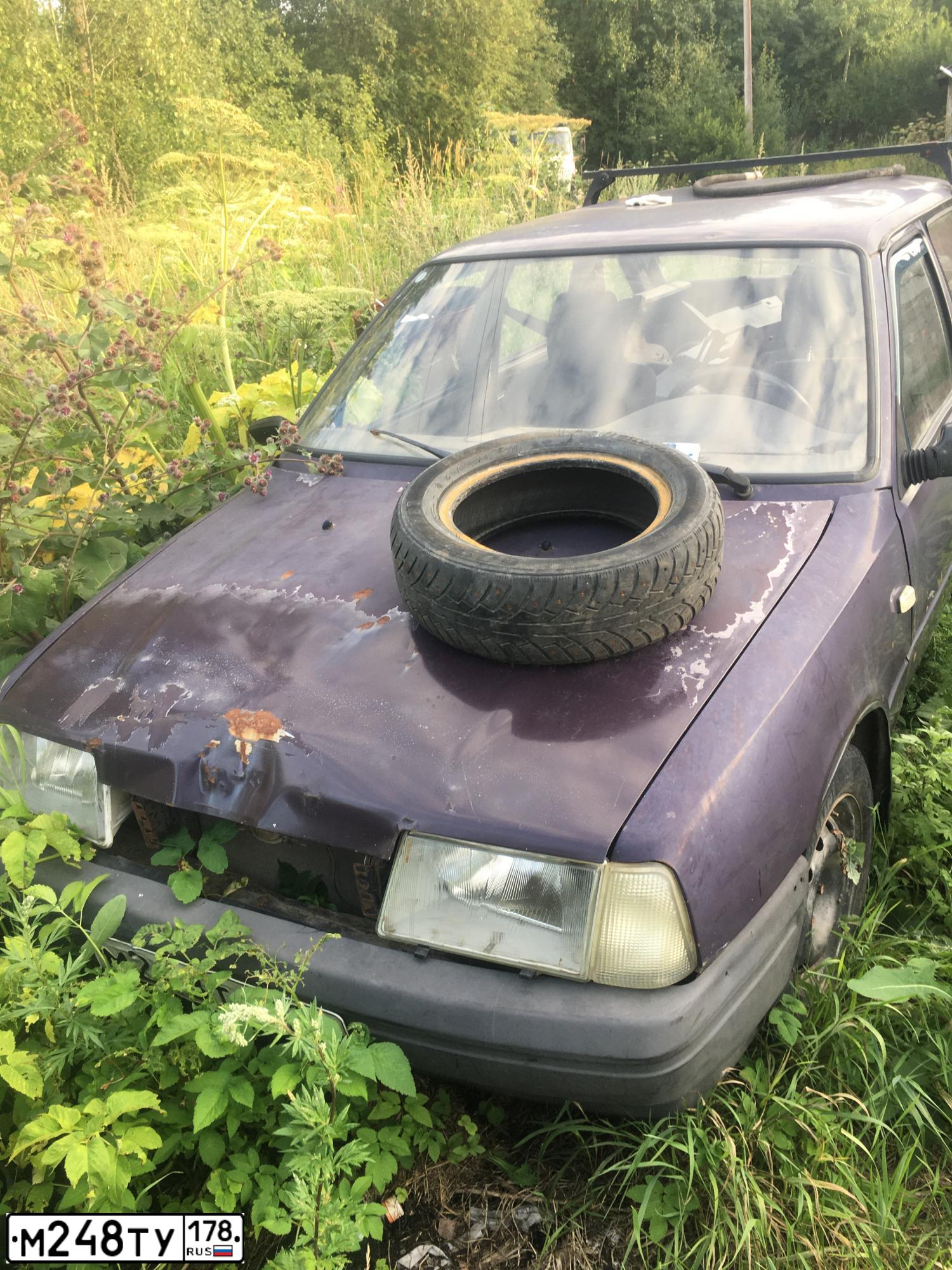 Фото автомобиля IZH 2126, 2004 — госномер М248ТУ178. Цвет: КОРИЧНЕВЫЙ"БАКЛАЖАН"