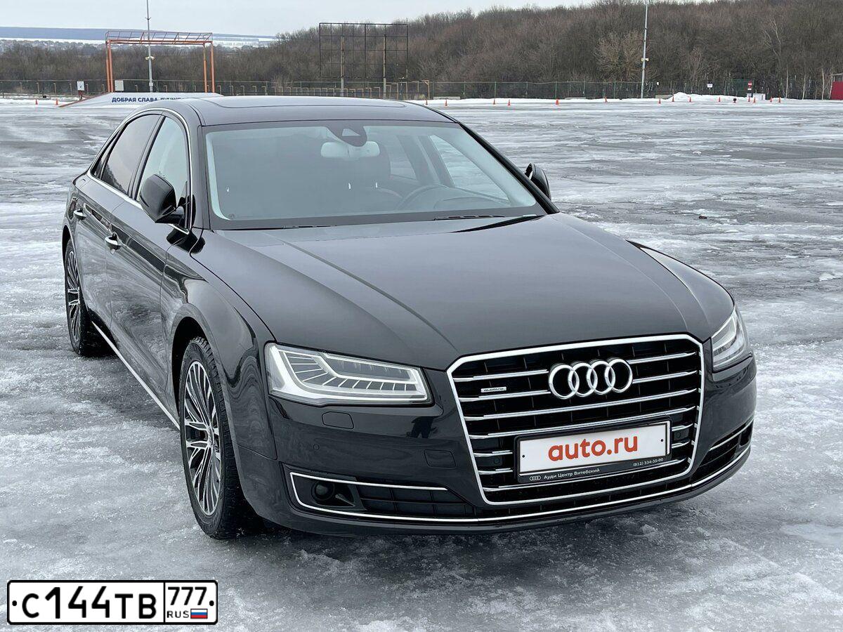 Фото автомобиля АУДИ A8L, 2016 — госномер С201СТ799. Цвет: ЧЕРНЫЙ