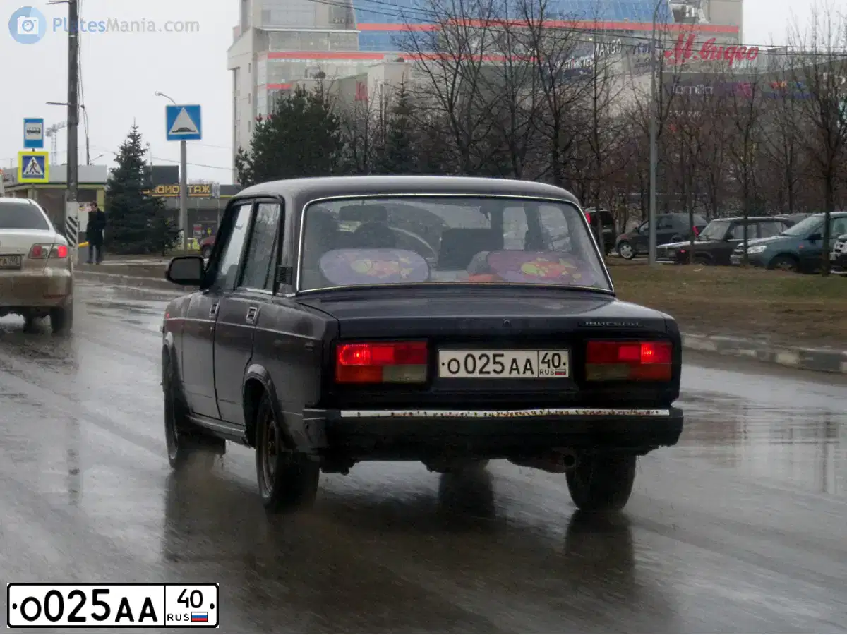 Фото автомобиля LADA 2107 LADA, 2003 — госномер О025АА40. Цвет: ФИОЛЕТОВЫЙ